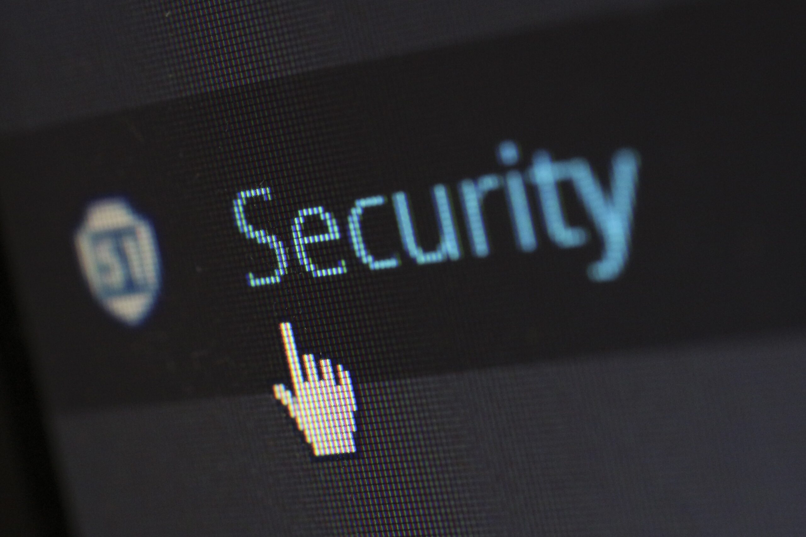 Texte "Security" avec curseur en forme de main pointant dessus.